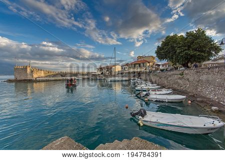 NAFPAKTOS, GREECE - MAY 28, 2015: Sunset panorama of Fortification at the port of Nafpaktos town, Western Greece