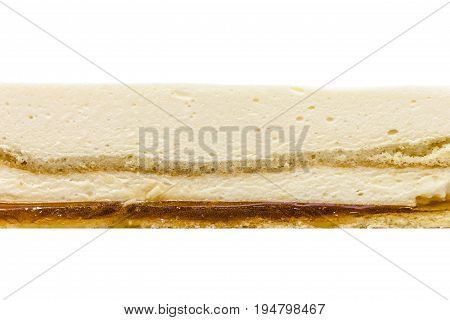 Orange mousse cake texture on white background. Orange biscuit orange mousse cream orange jelly