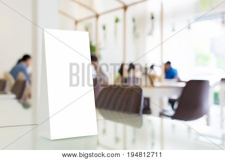 Mock up blank template menu frame in restaurant with blurred background Clipping path included