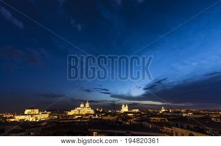 Night view of Salamanca cityscape:the Cathedral, the Pontifical University and Dominican monastery of San Esteban illuminated. The Old city of Salamanca is declared by UNESCO a World Heritage Site.