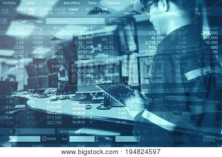 Double exposure of business man with glasses in hipster shirts holding tablet for check stock market graph with stock and computer graph background Business Trading concept.