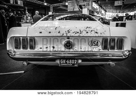 STUTTGART GERMANY - MARCH 17 2016: High performance Ford Mustang variant Boss 429 1969. Rear view. Black and white. Europe's greatest classic car exhibition 