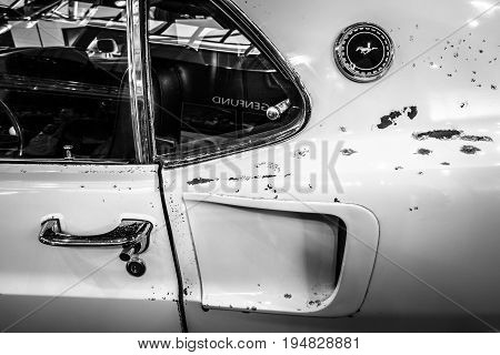 STUTTGART GERMANY - MARCH 17 2016: Fragment of a high performance Ford Mustang variant Boss 429 1969. Black and white. Europe's greatest classic car exhibition 