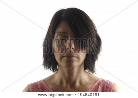 Portrait Of A Woman With Eyes Closed On White Background