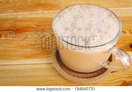 Hot tea with milk or 'Teh Tarik' the Malaysian favorite drink.