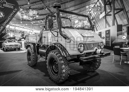 STUTTGART GERMANY - MARCH 18 2016: Multi-purpose auto four-wheel drive medium truck produced by Mercedes-Benz Unimog U600 1980. Black and white. Europe's greatest classic car exhibition "RETRO CLASSICS"