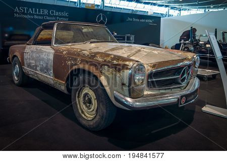 STUTTGART GERMANY - MARCH 18 2016: Prepared for the restoration of sports car Mercedes-Benz 230 SL Pagode (W113) 1968. Europe's greatest classic car exhibition 
