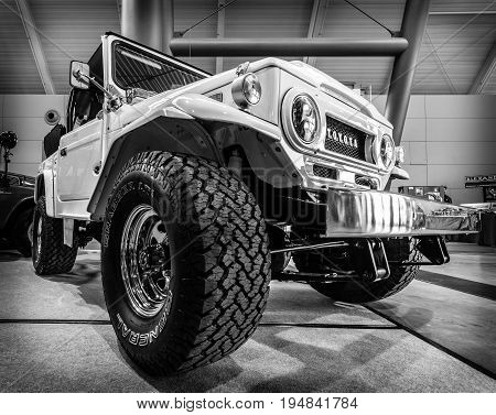 STUTTGART GERMANY - MARCH 18 2016: Compact SUV Toyota Land Cruiser J40 1977. Black and white. Europe's greatest classic car exhibition 