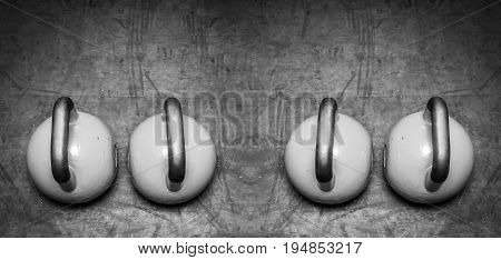 Kettle bells on the gym floor. Kettle bell sport.