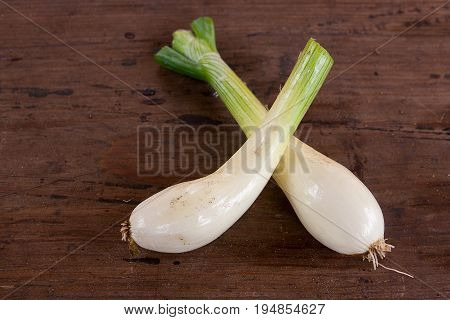Spring Onions, Harvested Vegetables On Vintage Wooden Background..