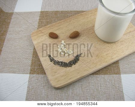 Almond milk and facial expression of rolled oats and chia seeds