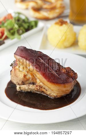 frankonian schaeufele roasted pork portion with dumplings