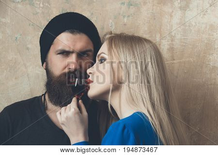Girl And Man Posing With Bottle Of Liqueur