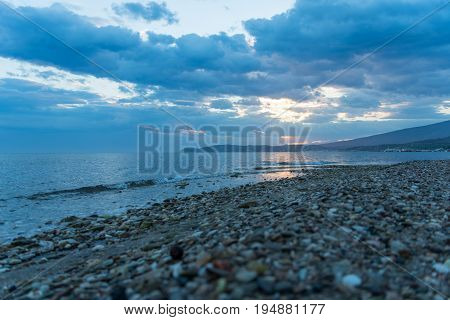 Long exposure of a dramatic sunset in greek island , Thasos