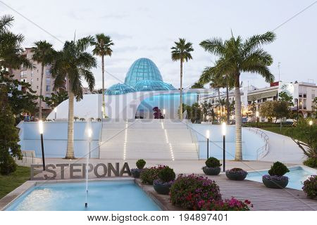 Estepona Spain - May 31 2017: The orchidarium of Estepona illuminated at dusk. City of Estepona Malaga Province Spain