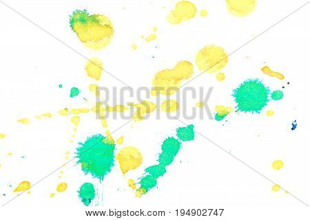 Abstract two-color yellow green ink splash. Ink blots. Elements of design. The water-soluble ink on white paper Leste. Abstract art