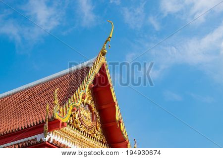 Beautiful art roof of the Buddhism temple Thailand. orange roof.