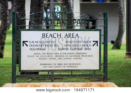 Honolulu Hawaii USA - May 28 2016: Kapiolani Park Sign - the park was given to the people of Hawaii from King Kalakaua in 1887 who named the park after his wife Queen Kapiolani.