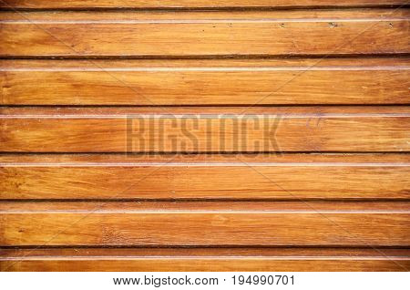 A Background With Horizontal Planks With Refief Surface With Slots Between Boards. Surface Varnished