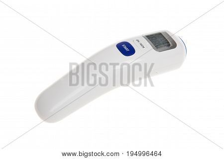 Electronic medical infrared thermometer forehead isolated on white