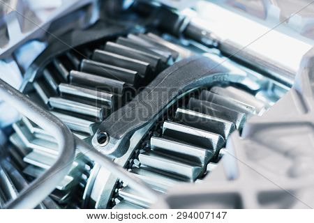 The Inner Structure Of The Automotive Gearbox. Visible Helical Gears And Wheels.