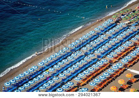 Positano, Italy - September 5, 2018 Positano Main Beach, Spiaggia Grande, With Colorful Umbrellas An