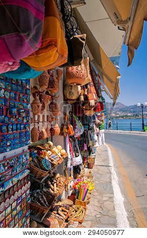 Streetside Gift Bazaar In Seaside Cretan Town Displaying Tourist Gifts For Sale.