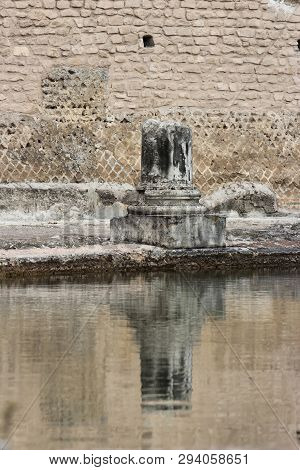 Ancient Roman Column Reflections At Tivoli, Italy