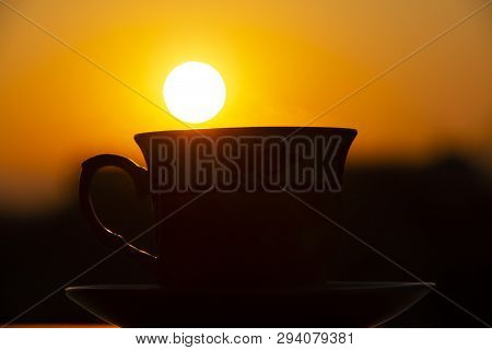 Silhouettes Of Sunrise Morning Coffee, Close Up Hot Coffee