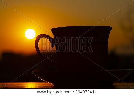 Silhouettes Of Sunrise Morning Coffee, Close Up Hot Coffee