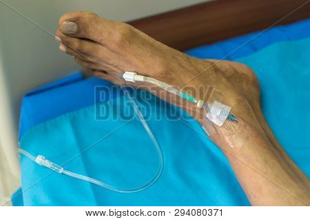Patient With Saline Intravenous In The Hospital