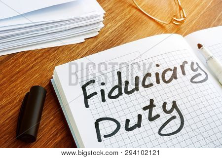 Fiduciary Duty Handwritten By Marker On A Note.