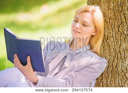 Girl Lean On Tree While Relax In Park Sit Grass. Self Improvement Book. Self Improvement And Educati