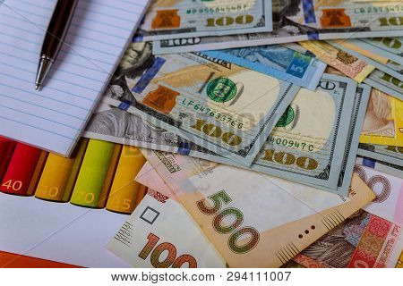 Ukrainian Hryvnias And Us Dollar Exchange Currency Money Banknotes: Usd And Uah.