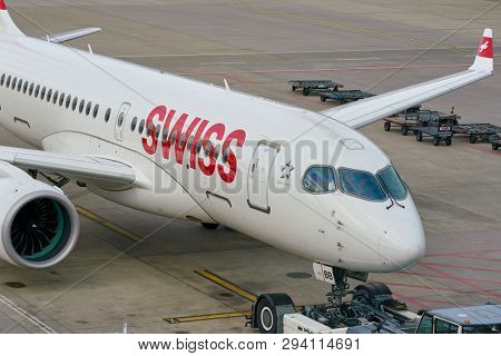 ZURICH, SWITZERLAND - CIRCA OCTOBER, 2018: an Swiss aircraft on pushback at Zurich International Airport.