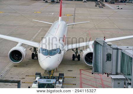 ZURICH, SWITZERLAND - CIRCA OCTOBER, 2018: an Swiss aircraft on pushback at Zurich International Airport.