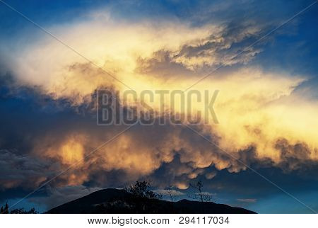 Photography Of A Particular Formation Of Clouds On Top Of The Iguaque Mountain, At Sunset, In The Ce