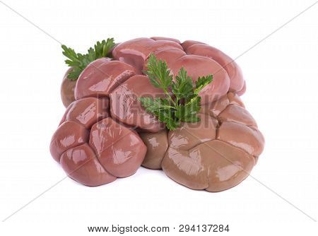 Beef Kidney Raw Isolated On White Background. Close Up. Cow Kidney Isolated With Parsley Leaves.