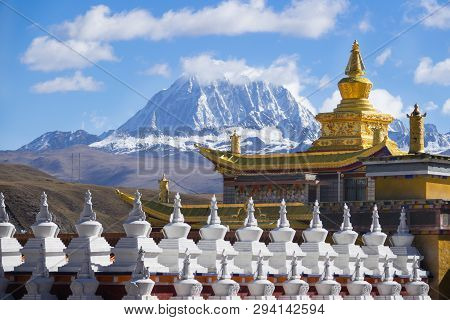 Tagong Temple  And Background Tibetan Holy Mountain Mt. Yala And Sichuan, China.