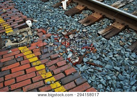 Abandoned Brick Train Depot With Tracks And Graffiti