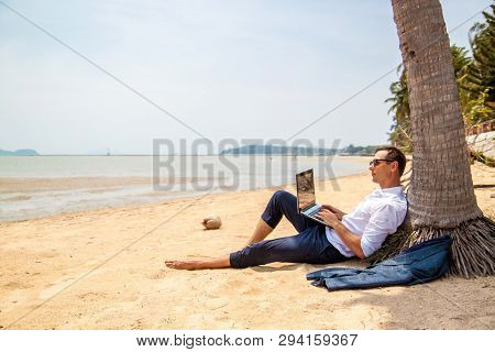 Telecommuting, Businessman Relaxing On The Beach With Laptop And Palm, Freelancer Workplace, Dream J