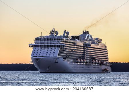 BAR HARBOR, MAINE, USA - OCTOBER 11, 2016: Regal Princess a Royal-class cruise ship operated by Princess Cruises is docking early morning in Bar Harbor 