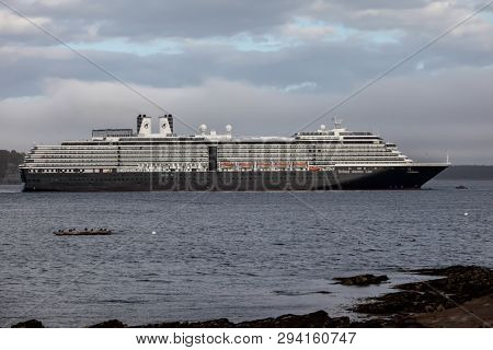 BAR HARBOR, MAINE, USA - OCTOBER 13, 2016: Bar Harbor  with docking cruise ship Zuiderdam from Holland American Line  with early afternoon lights during Autumn season