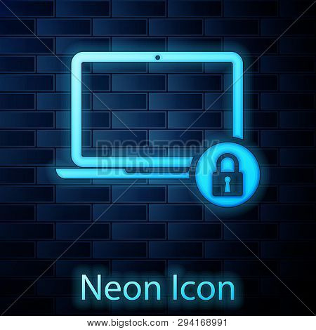 Glowing Neon Laptop And Lock Icon Isolated On Brick Wall Background. Computer And Padlock. Security,