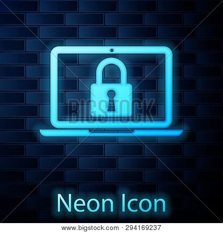 Glowing Neon Laptop And Lock Icon Isolated On Brick Wall Background. Computer And Padlock. Security,