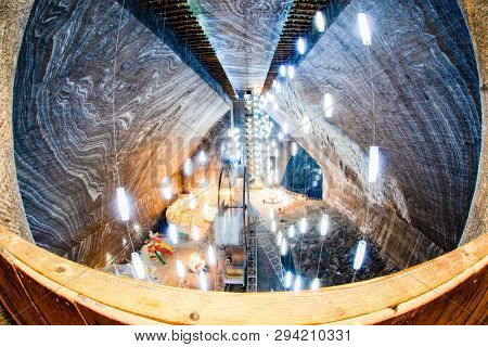 TURDA, ROMANIA - MARCH 10, 2018: Turda Salt Mine or Salina Turda, well known landmark in Transylvania with an underground museum and theme park, Romania, Europe