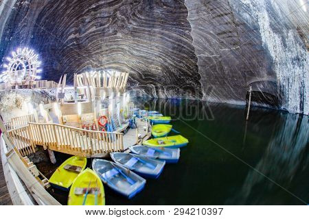 TURDA, ROMANIA - MARCH 10, 2018: Turda Salt Mine or Salina Turda, well known landmark in Transylvania with an underground museum and theme park, Romania, Europe