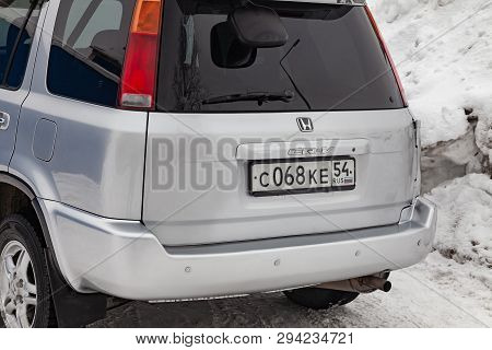 Novosibirsk, Russia - 03.10.2019: Rear View Of Honda Cr-v First Generation In Silver Color After Cle