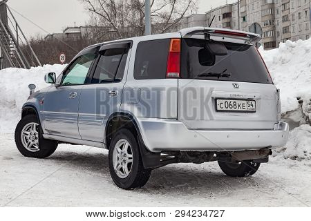 Novosibirsk, Russia - 03.10.2019: Rear View Of Honda Cr-v First Generation In Silver Color After Cle