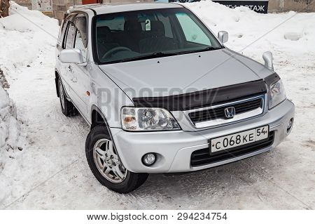 Novosibirsk, Russia - 03.10.2019: Front View Of Honda Cr-v First Generation In Silver Color After Cl